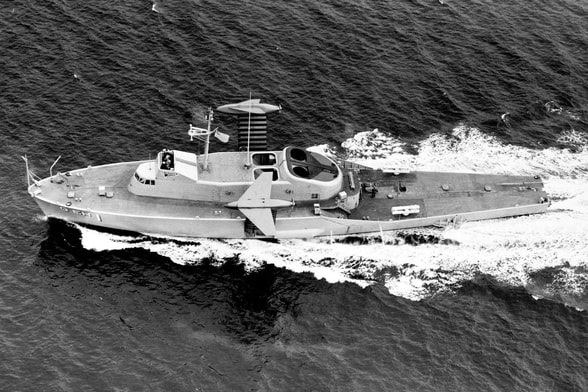 USS Plainview with hydrofoil fins raised