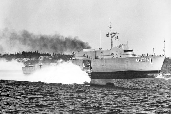 USS Plainview with hydrofoil fins deployed